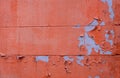 Grunge Concrete Wall Texture peeling paint, old cracked wall peach or pink colored closeup Royalty Free Stock Photo