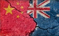 Grunge country flag illustration cracked concrete background / China vs Australia Political or economic conflict
