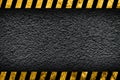 Grunge dark grey background with warning stripes Royalty Free Stock Photo