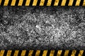 Grunge dark grey background with warning stripes Royalty Free Stock Photo