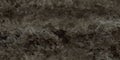 Grunge dark grey brown stone wall texture of cracked concrete rock or asphalt. Gray Surreal Pavement