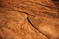 grunge, detailed close-up wet clay texture. Wet mud with drips from rain, sunlight. The surface of Mars