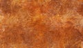 Grunge dirty rusty orange brown marbled and spilled background texture with liquid lines on some parts Royalty Free Stock Photo