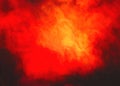 Grunge energy bright red orange flame on dark background Royalty Free Stock Photo