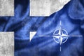 Grunge flags of Finland and NATO illustration