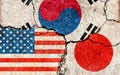 Grunge flags illustration of three countries with conflict and political problems cracked concrete background | USA, Japan and