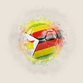 Grunge football with flag of zimbabwe