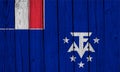 French Southern And Antarctic Lands Flag Over Wood Planks