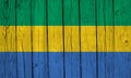 Gabon Flag Over Wood Planks