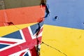 Grunge Germany, UK (Great Britain), Ukraine national flag isolated on broken wall background