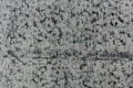 Grunge gray metal background or texture with scratches and cracks, closeup, top view Royalty Free Stock Photo