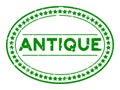 Grunge green antique word oval rubber stamp on white background