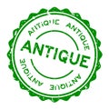 Grunge green antique word round rubber stamp on white background