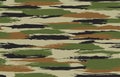 Grunge green and brown camouflage, modern fashion design. Khaki camo made brush strokes hand draws pattern.