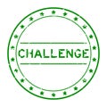 Grunge green challenge word round rubber stamp on white background