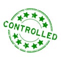 Grunge green controlled with star icon round rubber stamp on white background Royalty Free Stock Photo