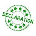 Grunge green declaration word round rubber stamp on white background