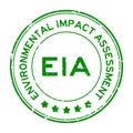 Grunge green EIA Environmental Impact Assessment word round rubber stamp on white background