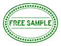 Grunge green free sample word oval rubber stamp on white background Royalty Free Stock Photo