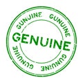 Grunge green genuine word round rubber stamp on white background