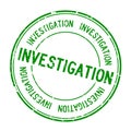 Grunge green investigation word round rubber stamp on white background