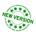 Grunge green new version word with star icon round rubber stamp on white background Royalty Free Stock Photo