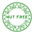 Grunge green nut free word with star icon round rubber stamp on white background Royalty Free Stock Photo