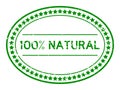 Grunge green 100 percent natural word oval rubber stamp on white background Royalty Free Stock Photo
