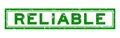 Grunge green reliable word rubber stamp on white background