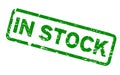 Grunge green in stock word square rubber stamp on white background Royalty Free Stock Photo