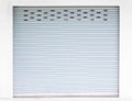 Grunge grey steel roller shutter door Royalty Free Stock Photo