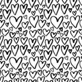 Grunge hand drawn hearts seamless pattern. Textured black ink paintbrush various heart shapes vector background. Romantic simple Royalty Free Stock Photo