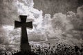 Grunge image of a cross in the cemetery, perfect halloween background Royalty Free Stock Photo