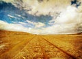 Grunge image of railroad tracks and blue sky Royalty Free Stock Photo