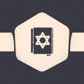 Grunge Jewish torah book icon isolated on grey background. Pentateuch of Moses. On the cover of the Bible is the image