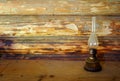 Grunge kerosene lamp on table