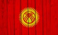 Kyrgyzstan Flag Over Wood Planks