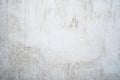 Grunge light gray texture of an old wall with black divorces, white surface with smudges, abstract background Royalty Free Stock Photo