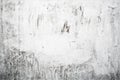 Grunge light gray texture of an old wall with black divorces, white surface with smudges, abstract background Royalty Free Stock Photo