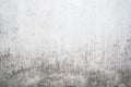 Grunge light gray texture of an old wall with black divorces, white surface with smudges, abstract background Royalty Free Stock Photo