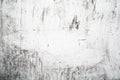 Grunge light gray texture of an old wall with black divorces, white surface with smudges, abstract background Royalty Free Stock Photo