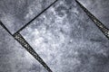 Grunge metal background. metal plate on black grille. Royalty Free Stock Photo