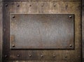 Grunge metal plate over rusty background Royalty Free Stock Photo