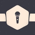 Grunge Microphone icon isolated on grey background. On air radio mic microphone. Speaker sign. Monochrome vintage