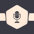 Grunge Microphone icon isolated on grey background. On air radio mic microphone. Speaker sign. Monochrome vintage