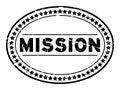 Grunge mission word oval rubber seal stamp on white background