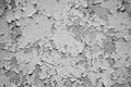 Grunge monochrome texture of the old wall with pieces of plaster