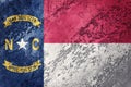 Grunge North Carolina state flag. North Carolina flag background