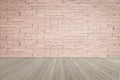 Grunge old aged brick wall painted in red brown color with wooden floor textured background in  sepia brown Royalty Free Stock Photo