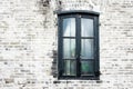 Grunge old brick wall with black window Royalty Free Stock Photo